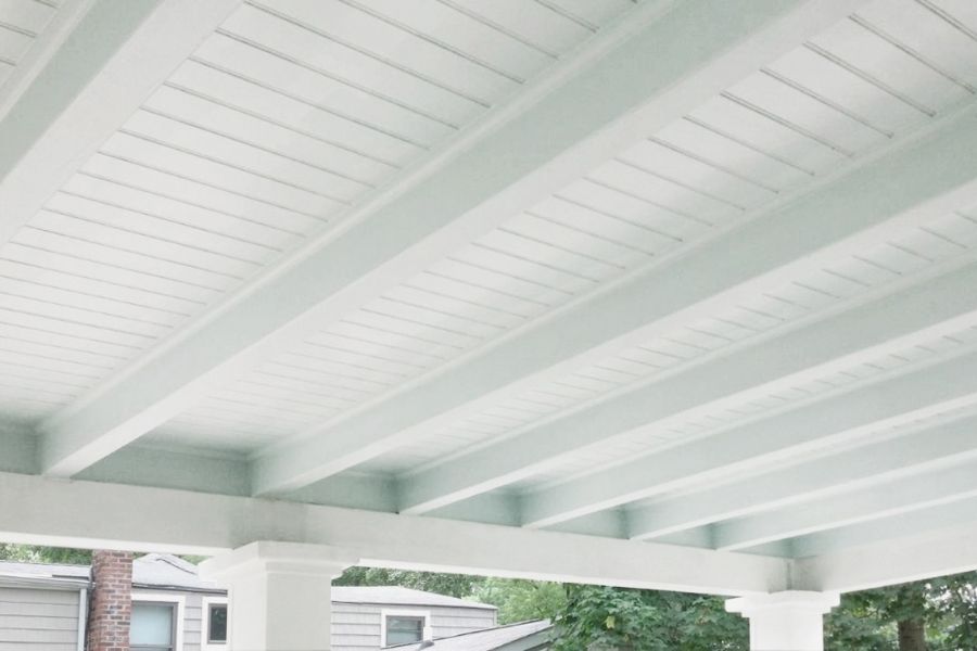 white beadboard porch ceiling with beams