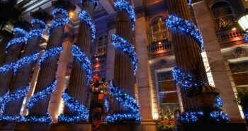 blue christmas lights on columns