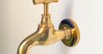 unlacquered brass outdoor water spigot